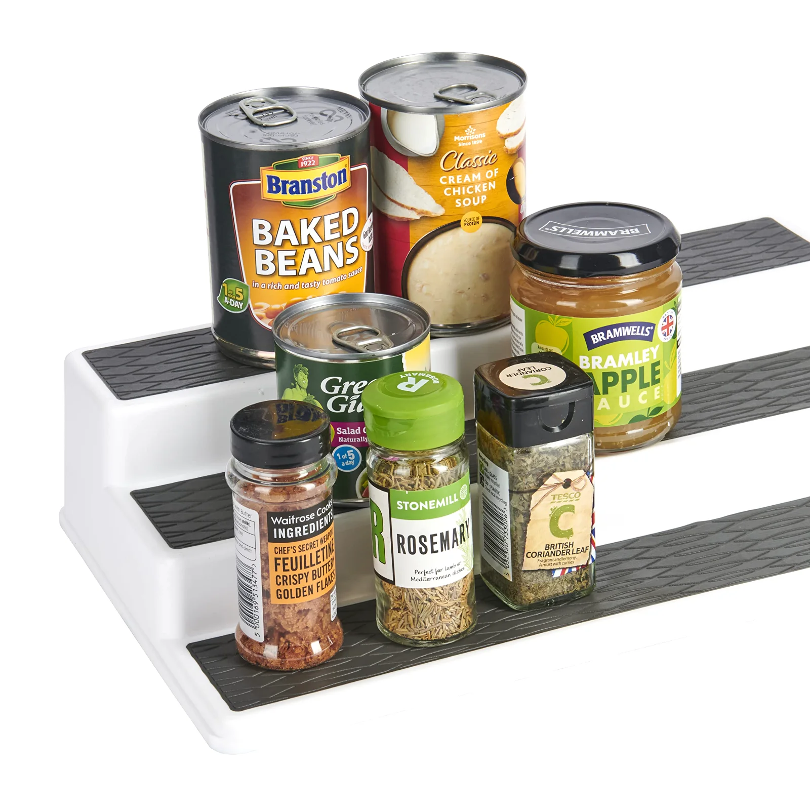 Cans on three tiers, every label readable from the front row.